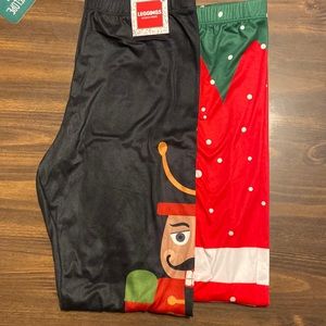 Bundle of 2 holiday prints leggings, size M. 1 pair is NWT other pair NWOT
